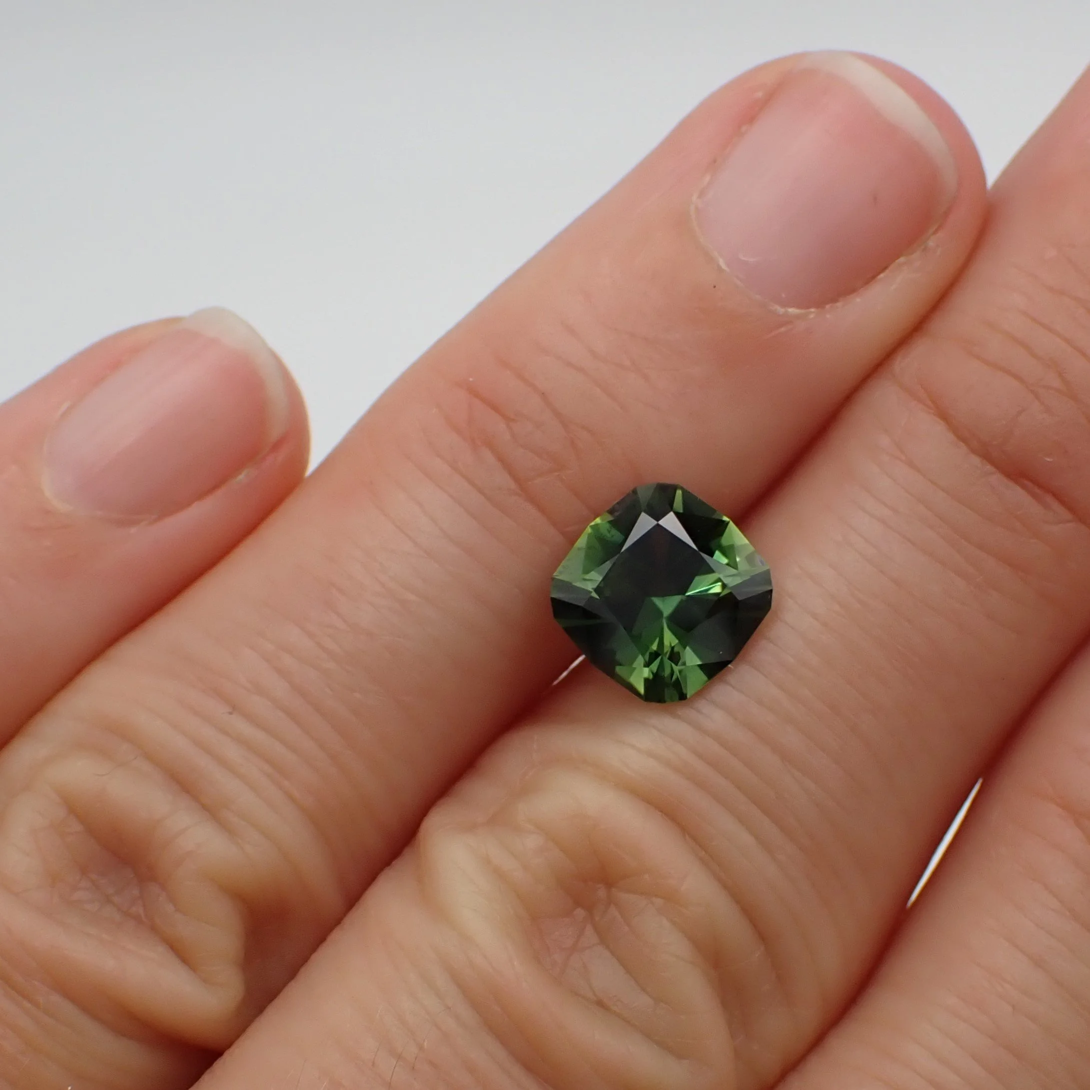 australian-green-sapphire-modified-cushion-cut-2.54ct-scale.JPG