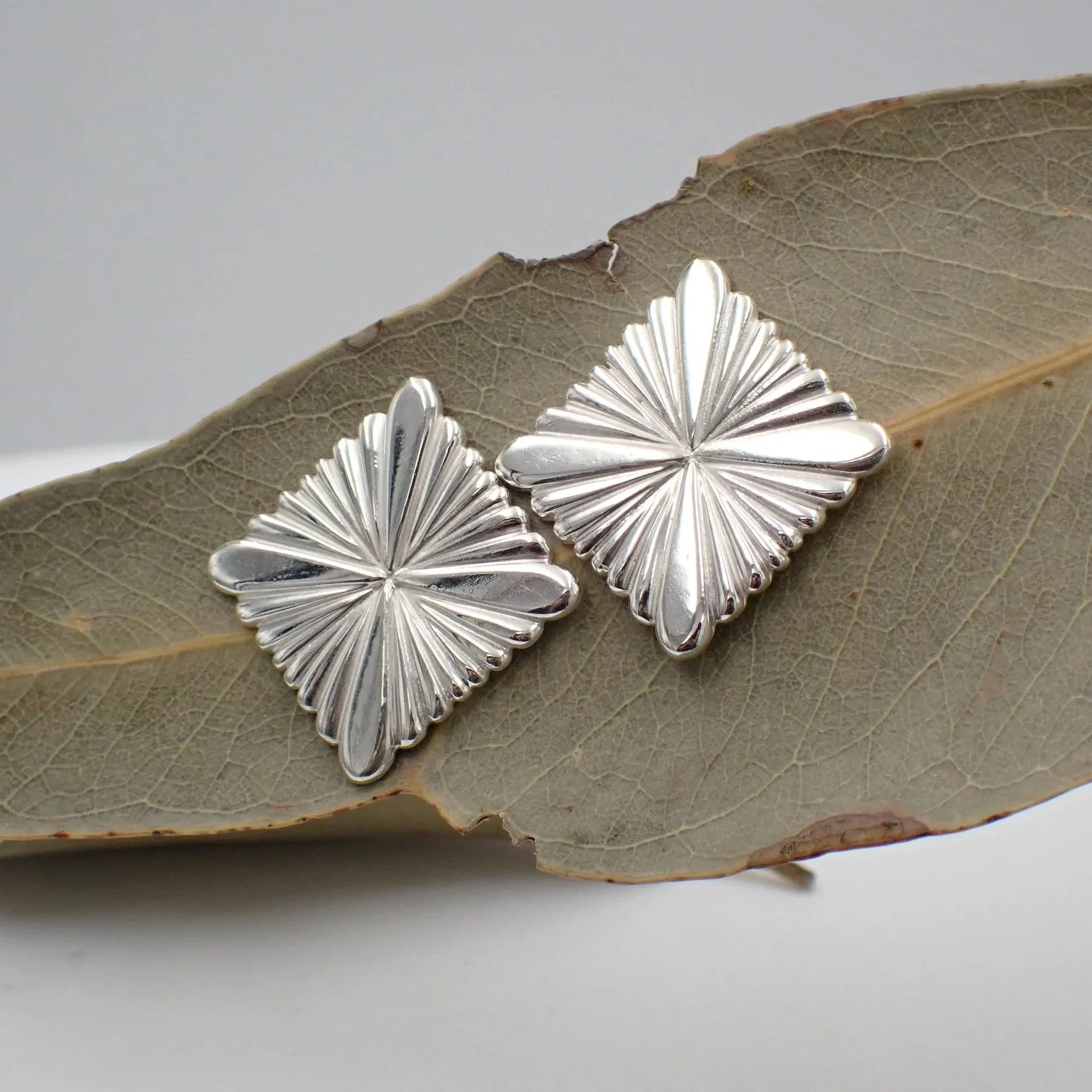 Quad+Radient+Silver+Studs+4.jpg