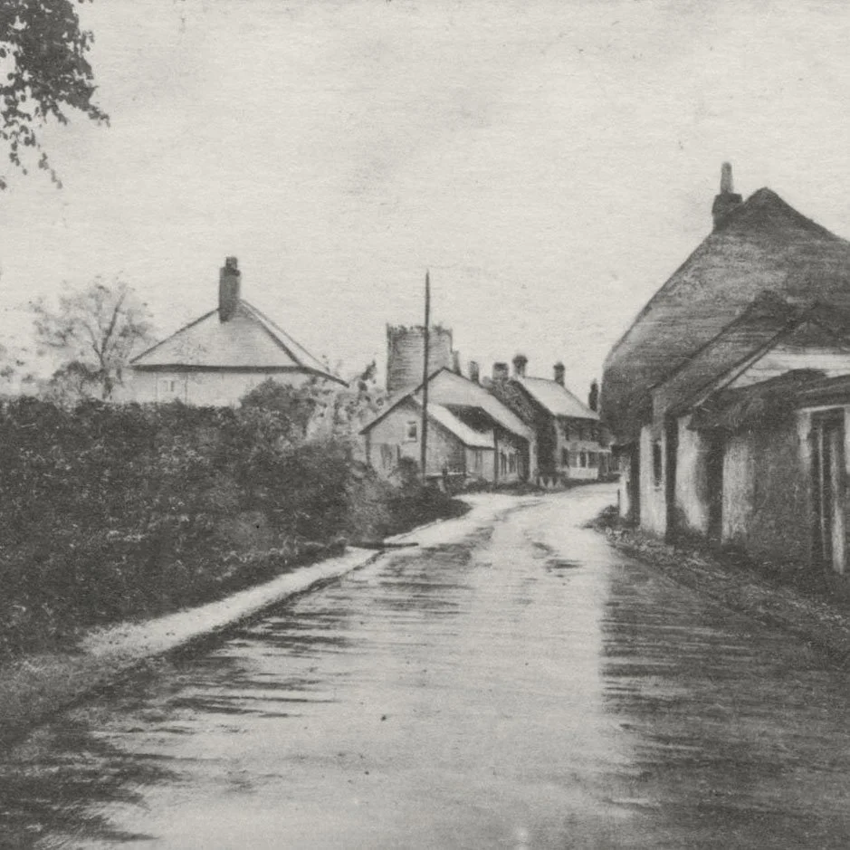 An old historic photograph of the village of Upavon in Wiltshire.