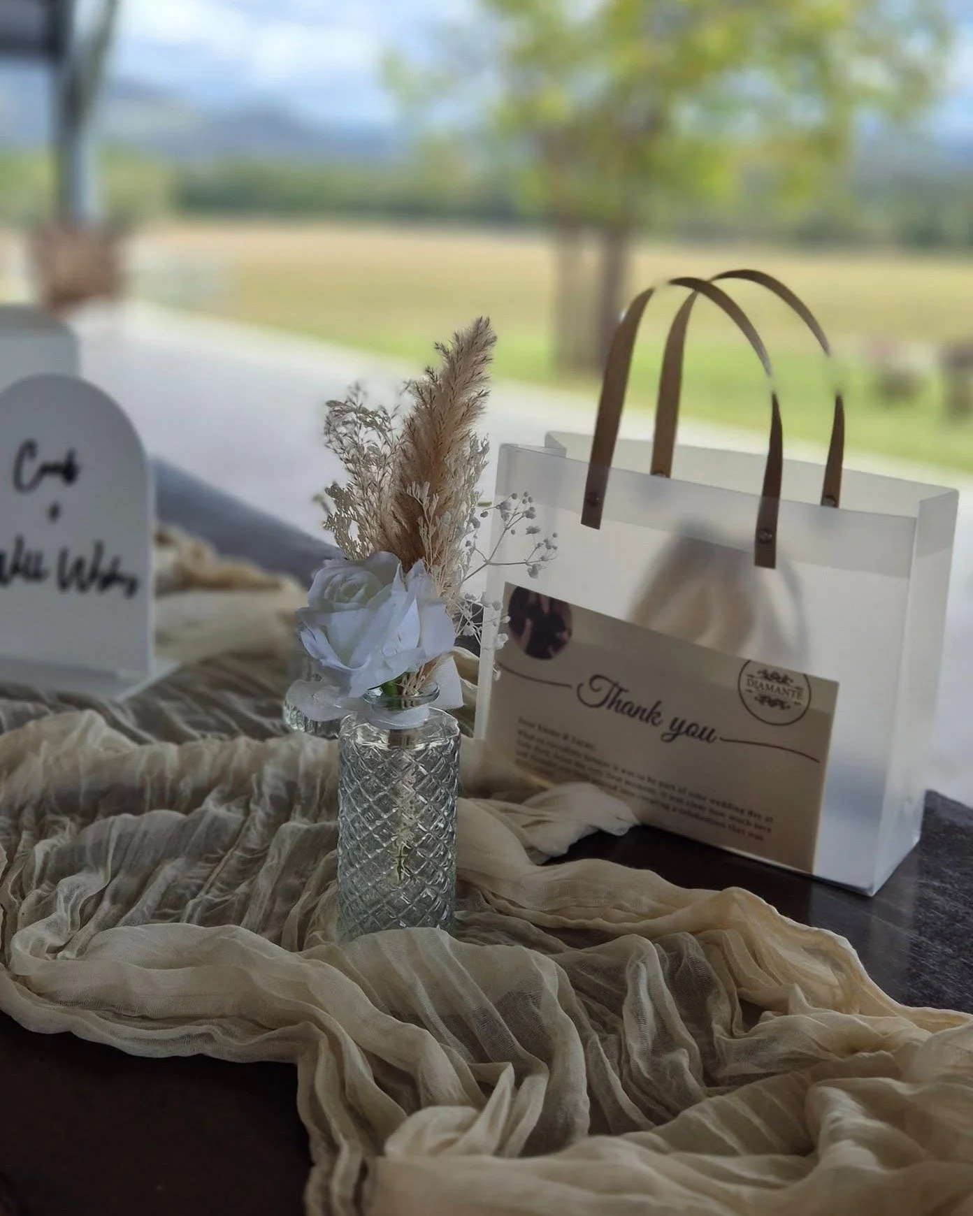First impressions matter. 🤍 For Emma &amp; Zayne's beautiful rural celebration, we created a welcoming entrance that set the tone for the entire day. Soft, flowing fabrics, textured pampas grass, and a modern wishing well created a space that felt b