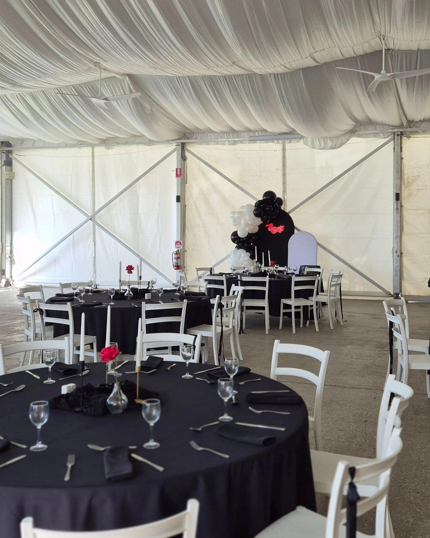 Monochrome magic. 🖤🤍

For Abbey &amp; Jared's celebration, we leaned into a dramatic, elegant black and white palette. Sometimes, the most striking designs come from keeping things simple and intentional. These black satin chair sashes against cris