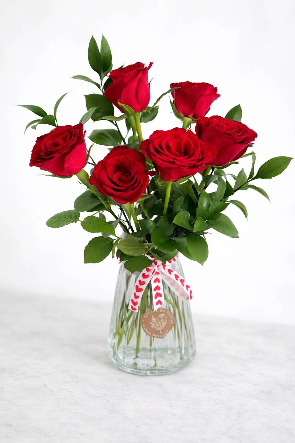 red roses in vase.jpg