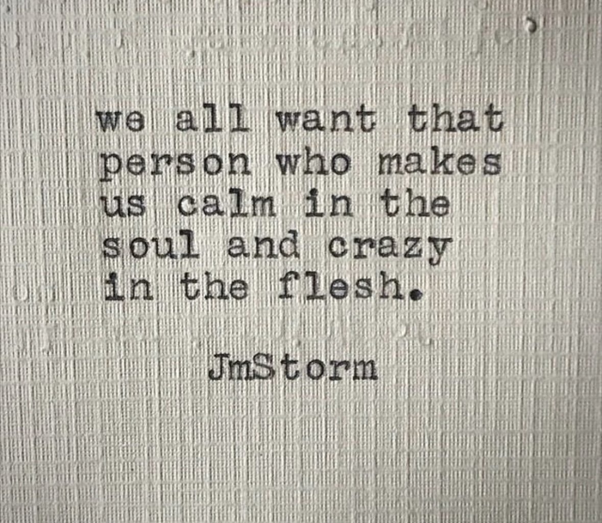 A fabric with a printed quote that reads, 'we all want that person who makes us calm in the soul and crazy in the flesh. JnStorm'.