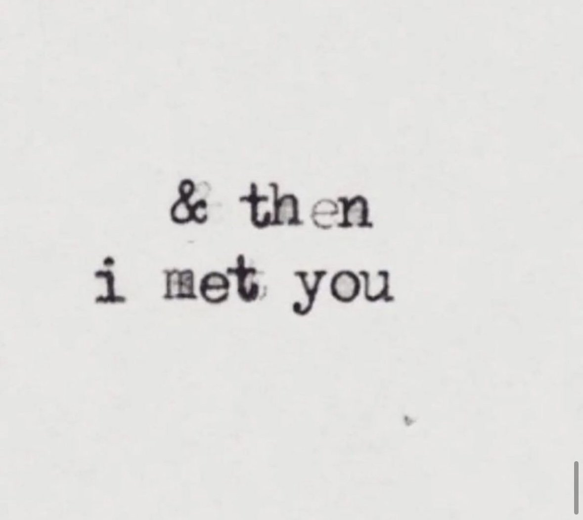 Typewriter style text reading '& then i met you' on a plain white background.