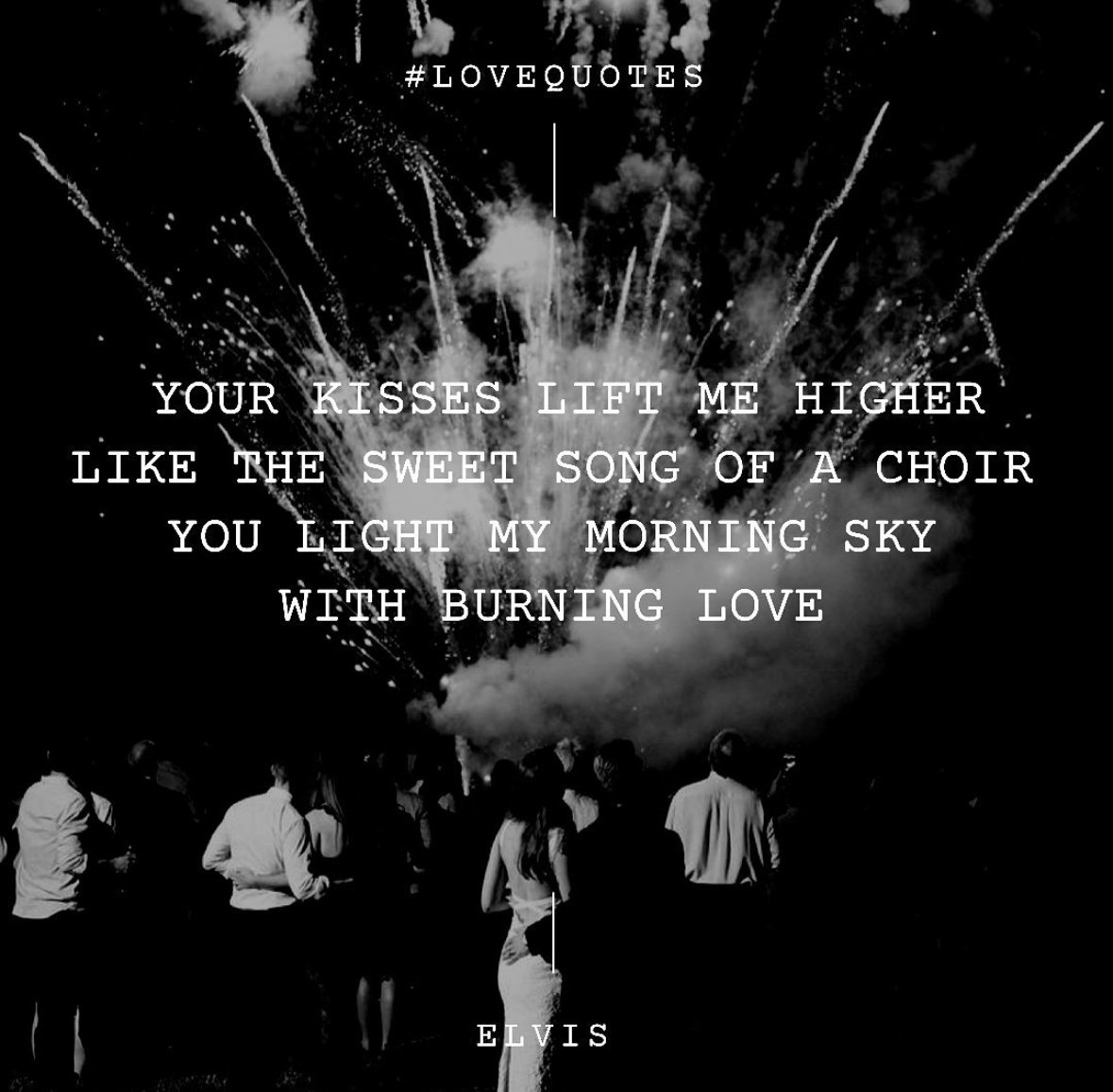 Black and white photo of a crowd watching fireworks with overlaid text of a love quote by Elvis Presley.