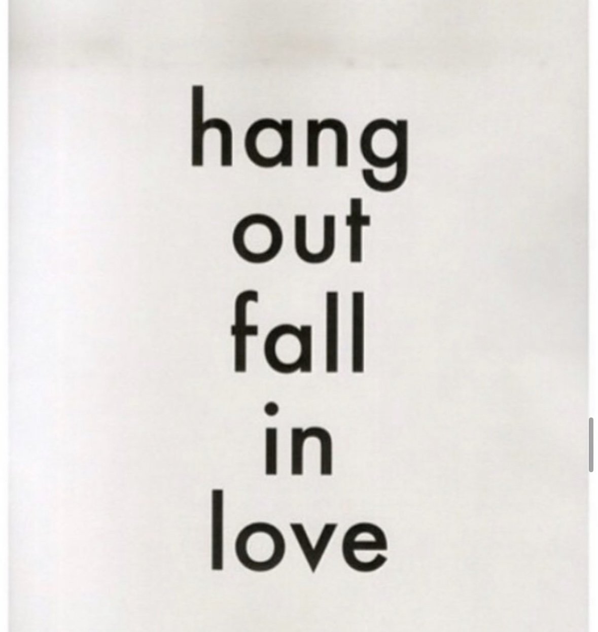 Text saying 'hang out fall in love' arranged vertically in black on a white background.