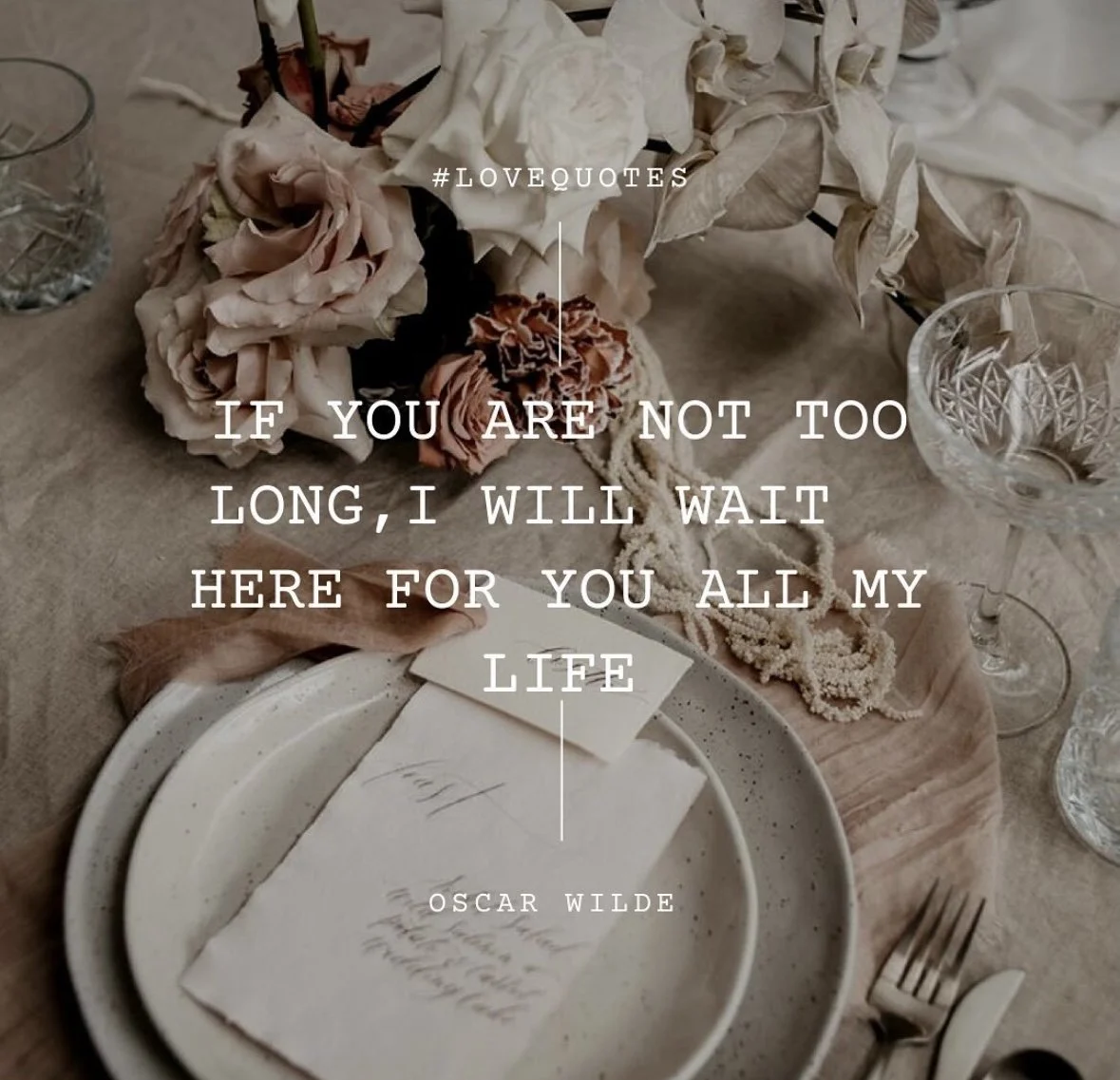 A romantic table setting with a bouquet of pink and brown dried flowers, drinking glasses, a plate with handwritten notes, and a soft beige tablecloth. Overlaid text features a quote by Oscar Wilde that reads, 'If you are not too long, I will wait he