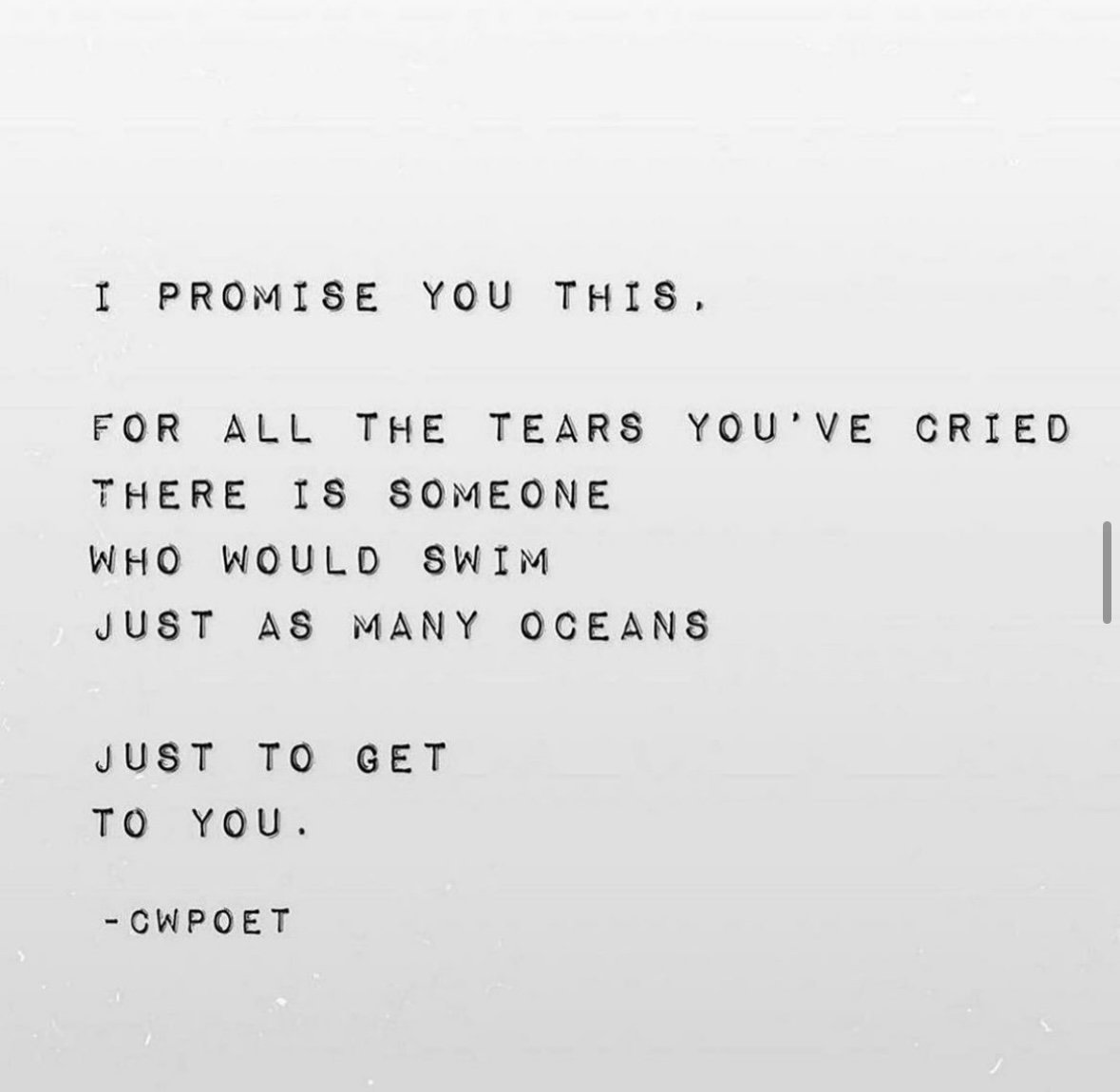 Typewritten quote about love and compassion on a white background.