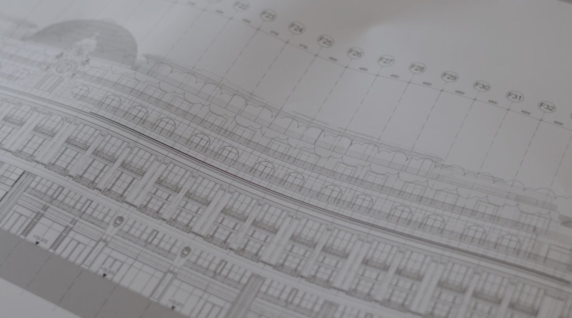 Architectural blueprint of a building with detailed design and measurements.