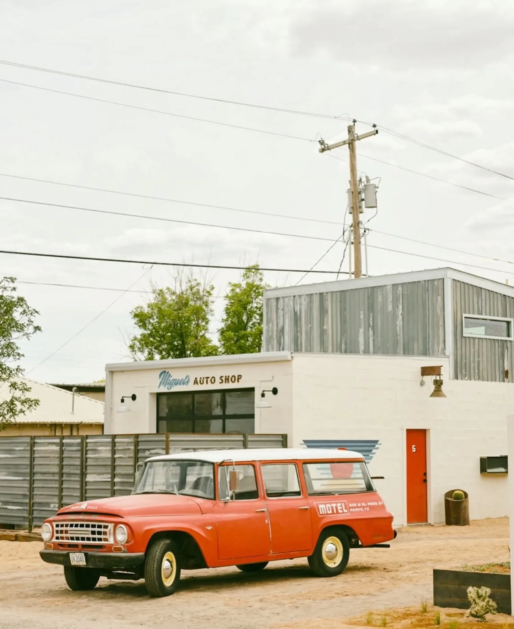Commonwealth-Interior-Design-Austin-Texas-Motel-Vintage-Car-At-Auto-Shop.jpg