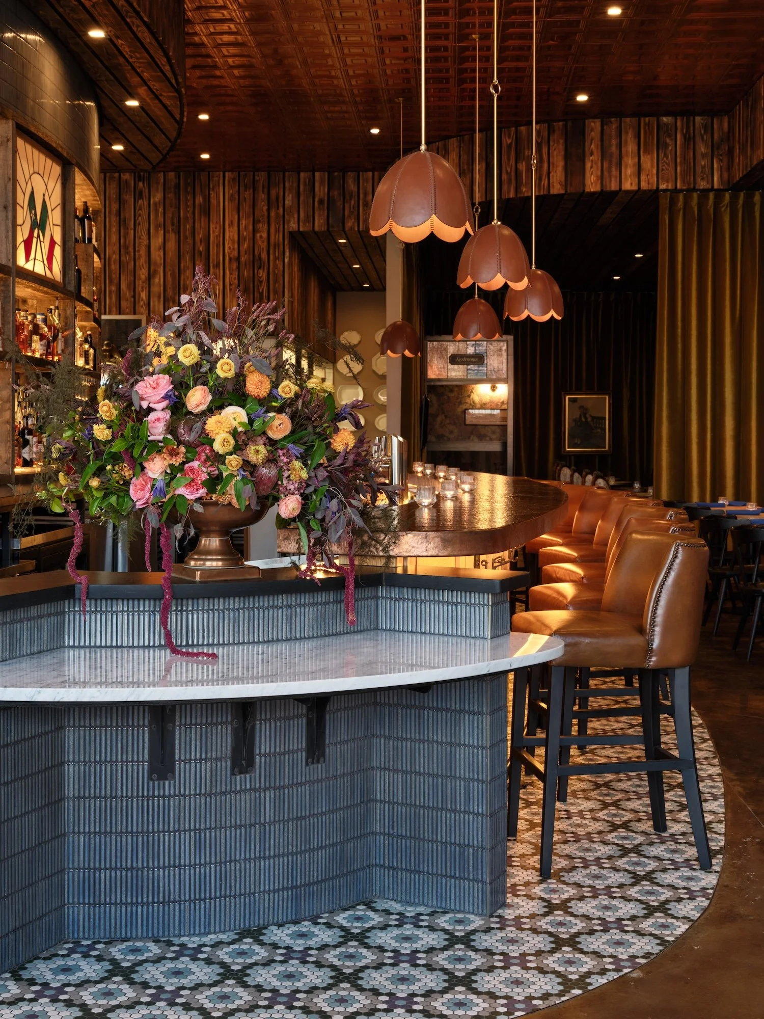 Commonwealth-Interior-Design-Austin-Texas-BonFire-Elegant-Bar-Interior-With-Flower-Arrangement.jpg