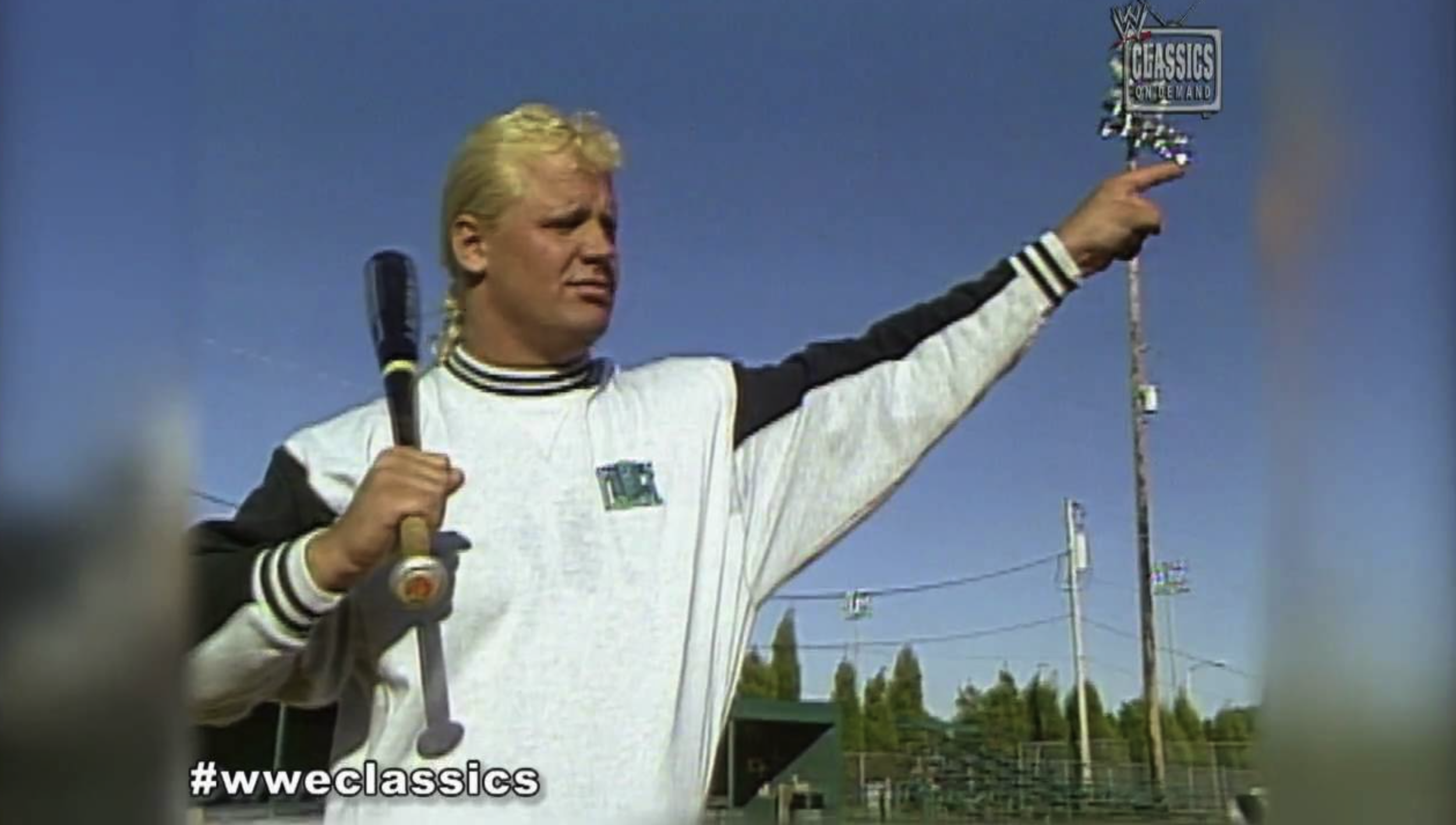 "Mr. Perfect" Curt Hennig impresses baseball Hall of Famer Wade Boggs with the 'perfect' swing.