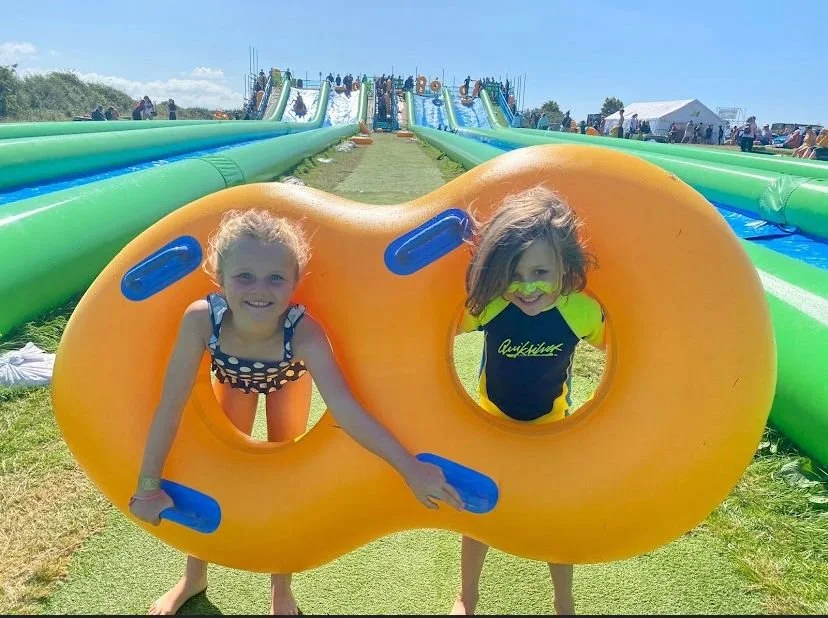 Little kids love the Giant Slip and Slide inflatables