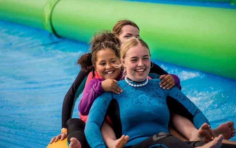 Teenagers enjoying a family day out  in Cornwall