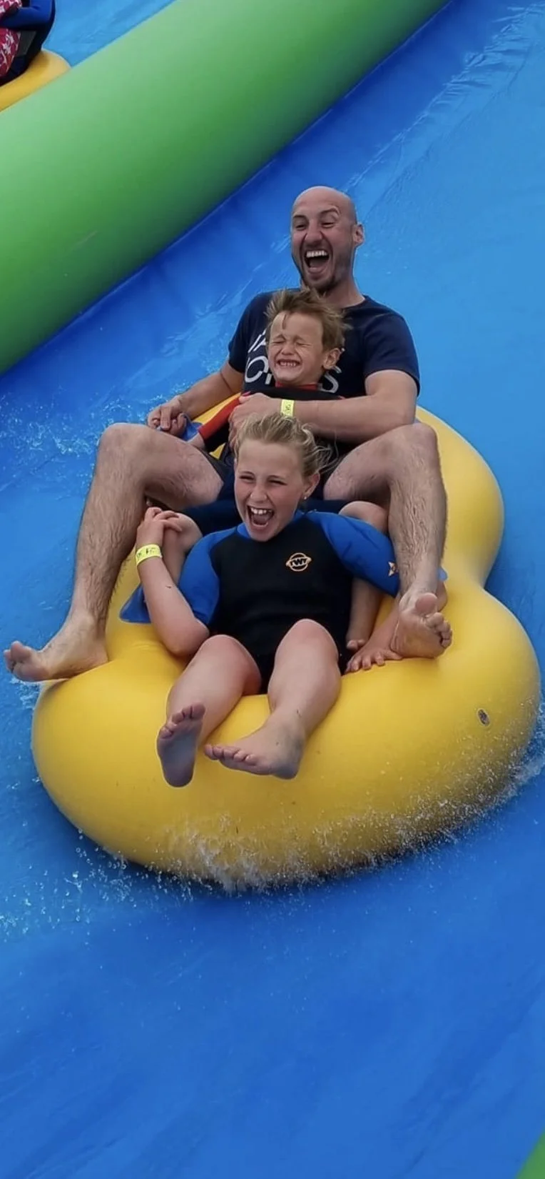 Use of inflatable rings and body boards included in price at Giant Slip and Slide Cornwall