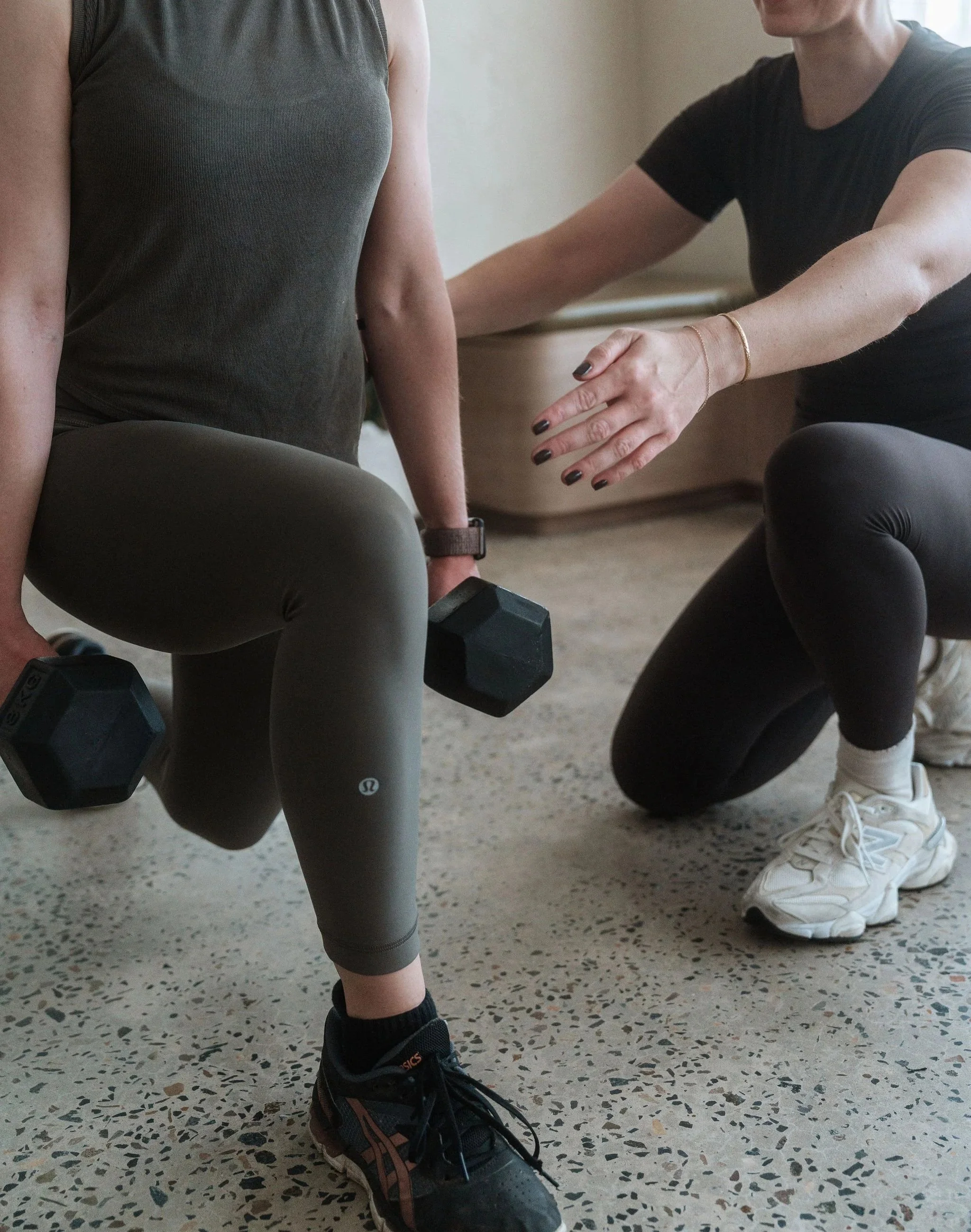 Exercise physiologist at CardioCare Clinic, assisting a client with a guided exercise program in Bondi Junction, Sydney