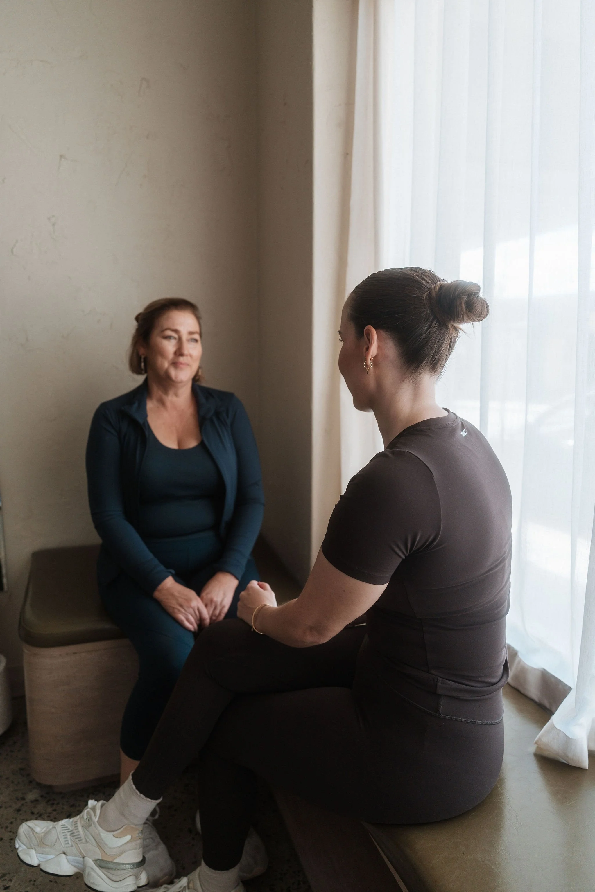 Exercise physiologist Sophie Wright in a one-on-one consultation with a client at CardioCare Clinic, Bondi Junction