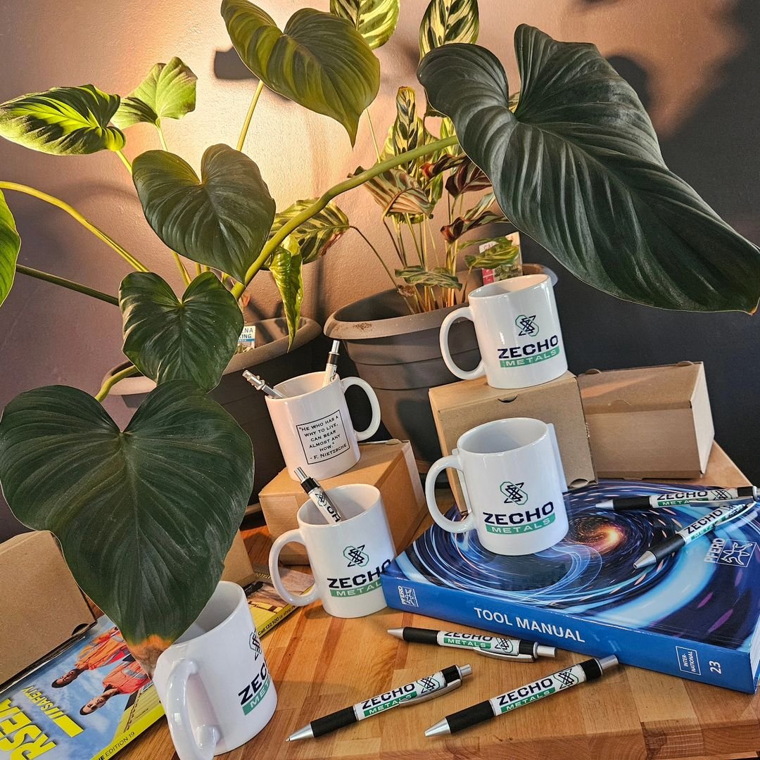 Zecho Metals Pty Ltd promotional mugs and pens display