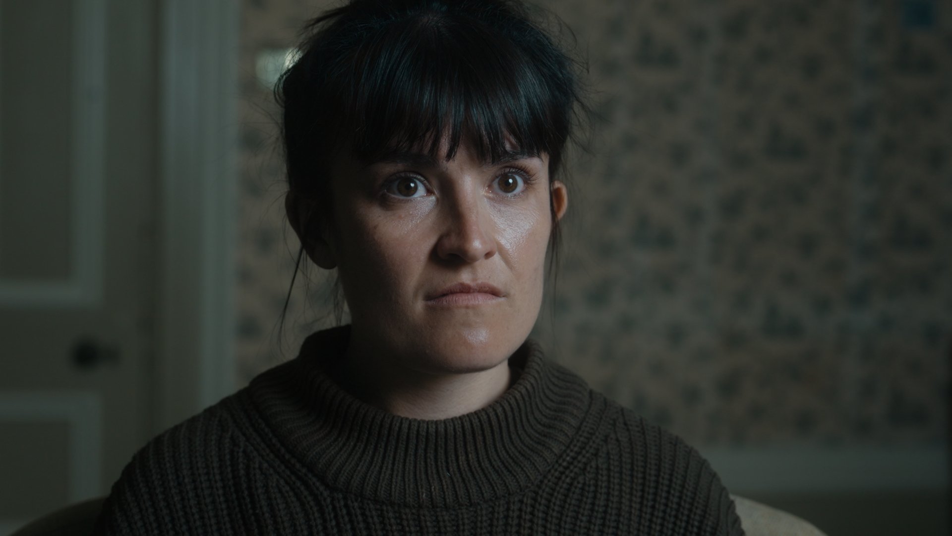 A closeup on an annoyed woman.