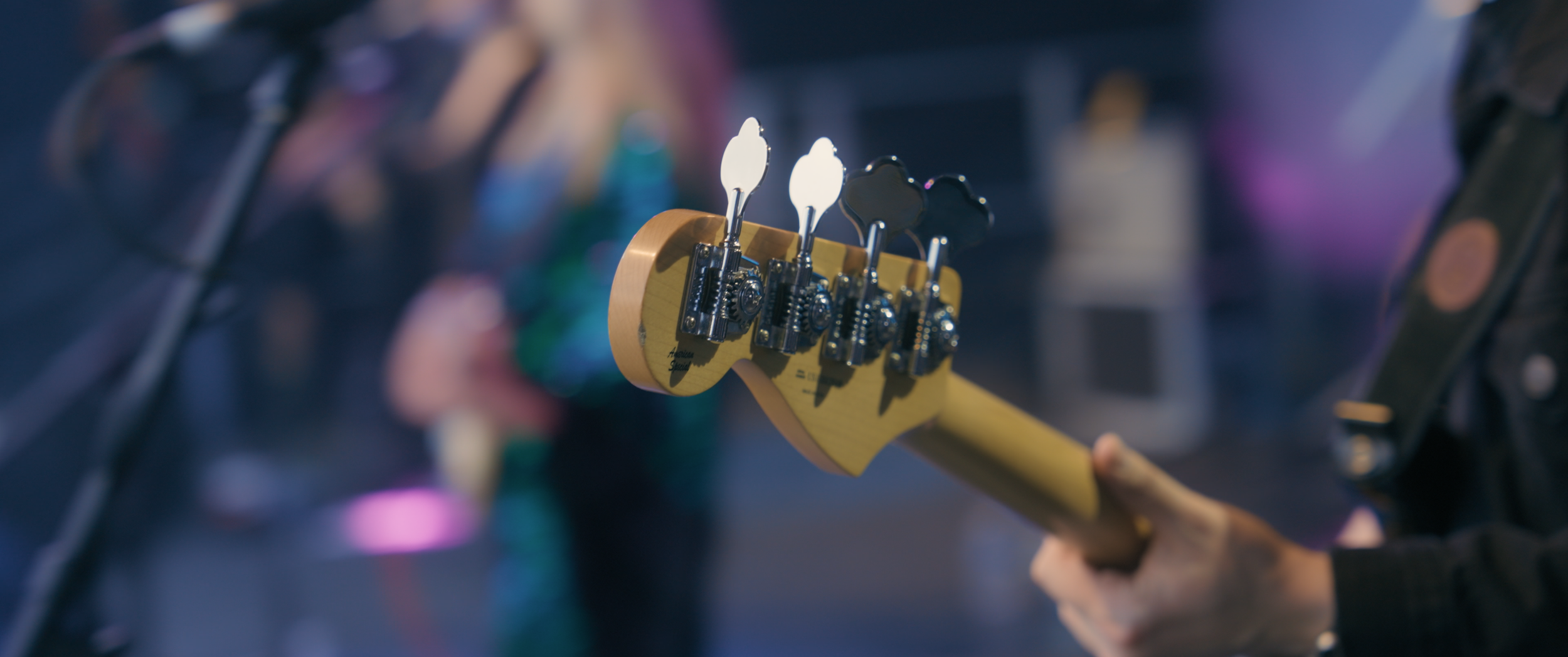 Closeup of the end of a guitar.