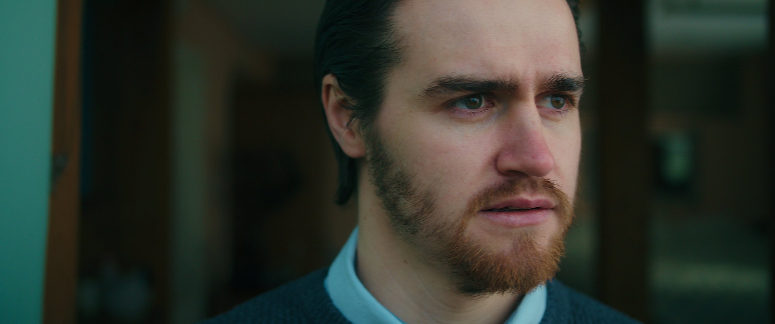 Closeup shot of a worried man.