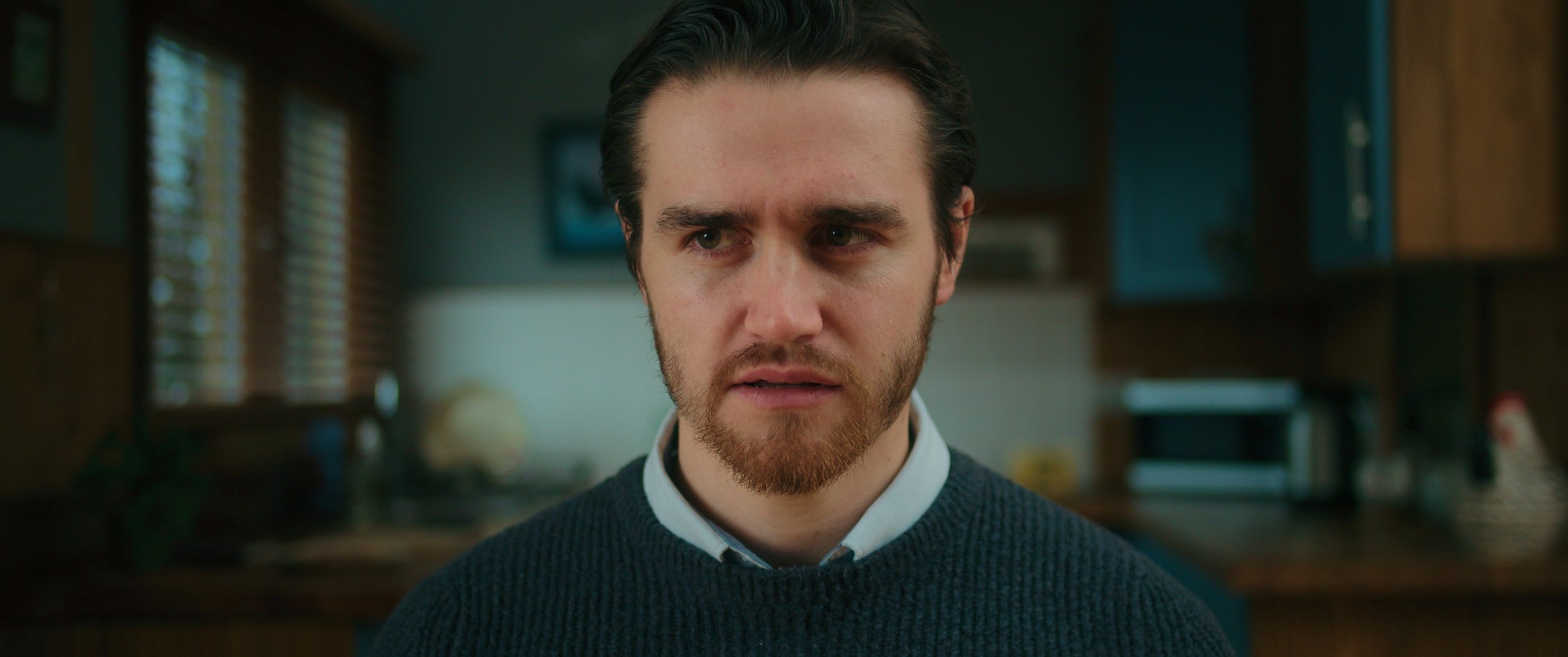 Closeup shot of a concerned man.