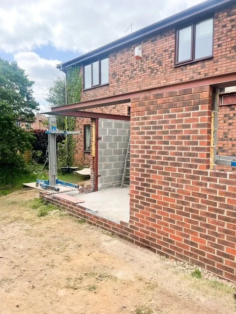 New kitchen modern kitchen extension in Henshall East Yorkshire. With wraparound bifold door, a canter-lever corner and skylights. Plus new kitchen installation and appliances.