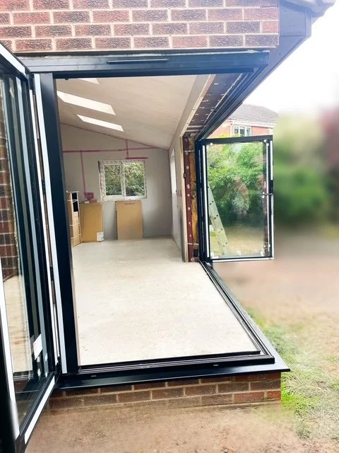 New kitchen modern kitchen extension in Henshall East Yorkshire. With wraparound bifold door, a canter-lever corner and skylights. Plus new kitchen installation and appliances.
