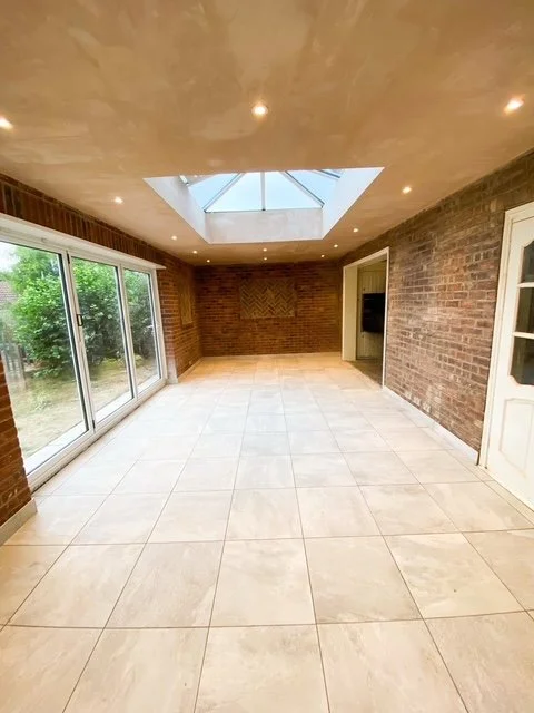 Interior photo of bright brick extension in Carton East Yorkshire, with large roof lantern skylight from BHY Contracts.
