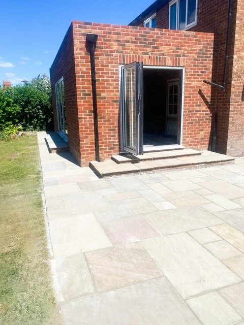 Exterior photo of bright brick extension with bifold doors in Carlton, East Yorkshire from BHY Contracts.