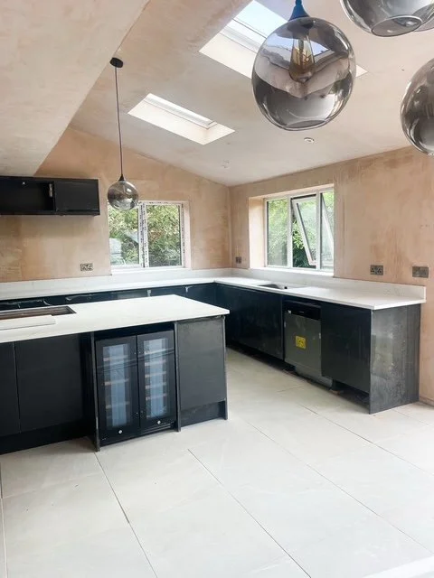New kitchen modern kitchen extension in Henshall East Yorkshire. With wraparound bifold door, a canter-lever corner and skylights. Plus new kitchen installation and appliances.