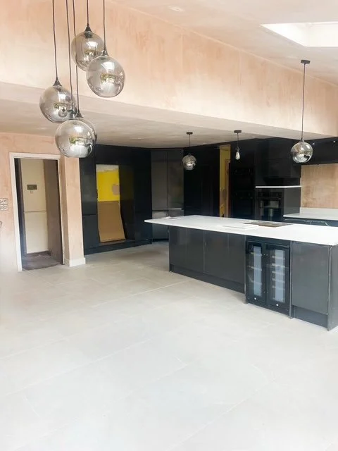 New kitchen modern kitchen extension in Henshall East Yorkshire. With wraparound bifold door, a canter-lever corner and skylights. Plus new kitchen installation and appliances.