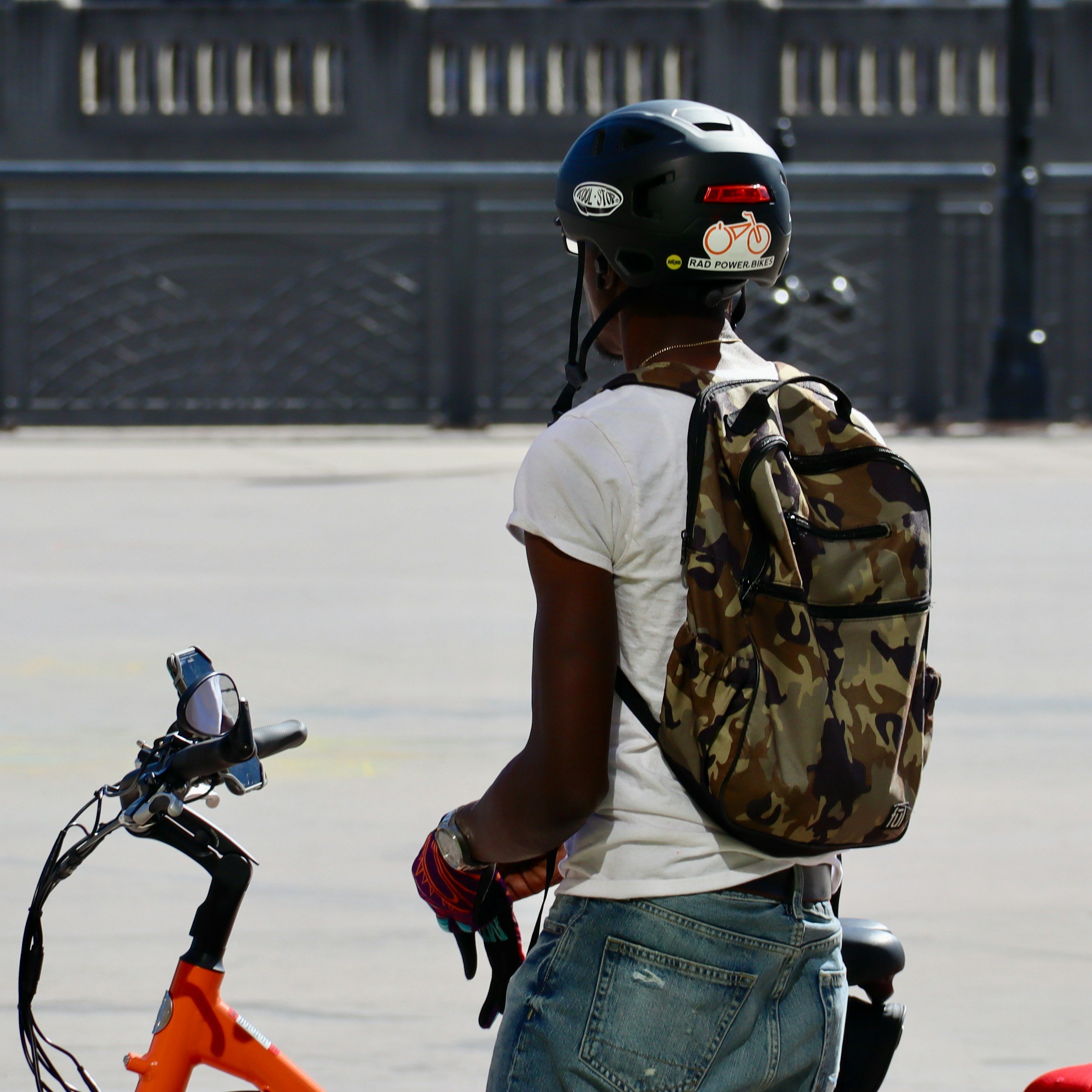 A young person with their bike