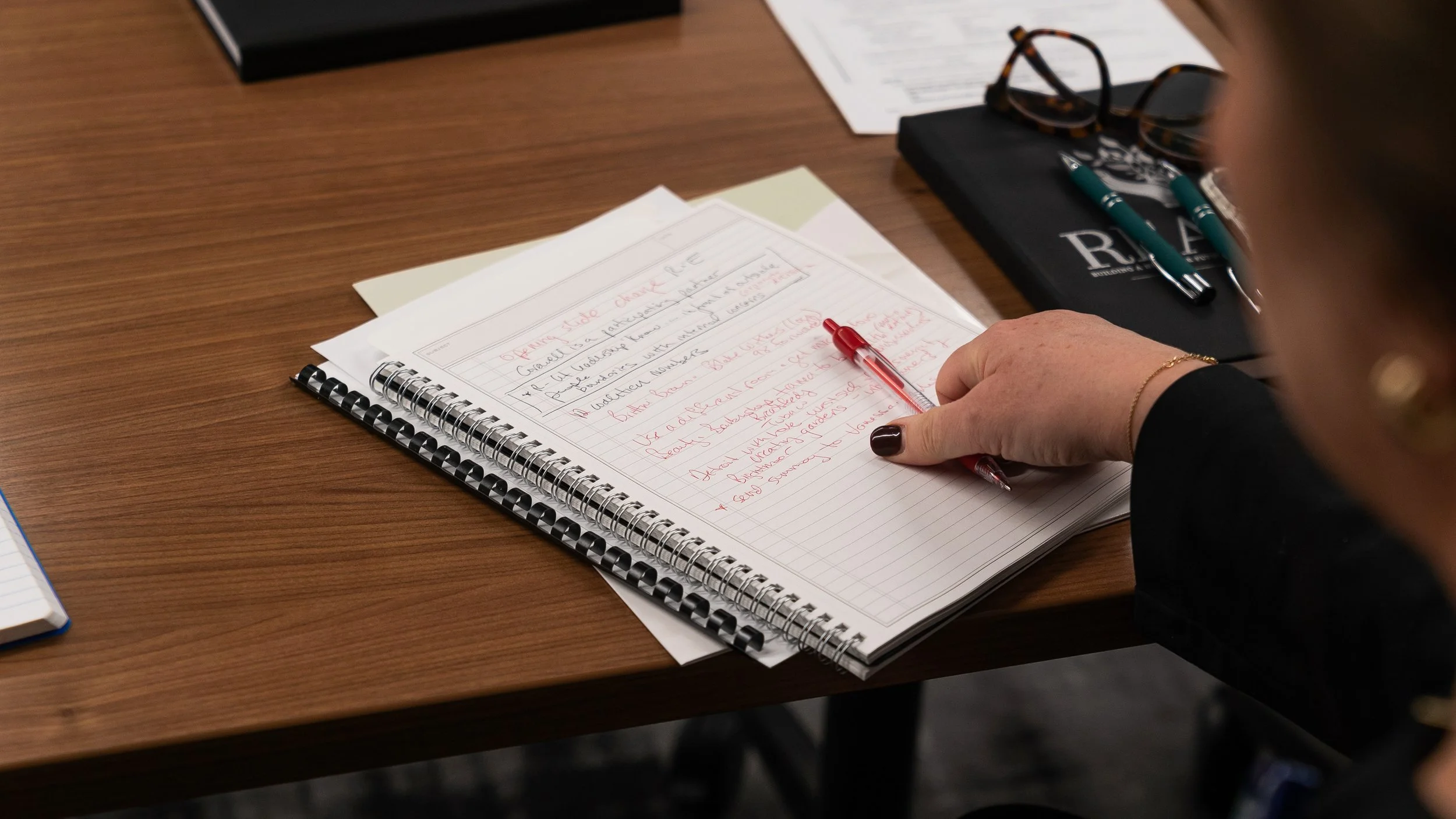 Taking notes in a paper notebook