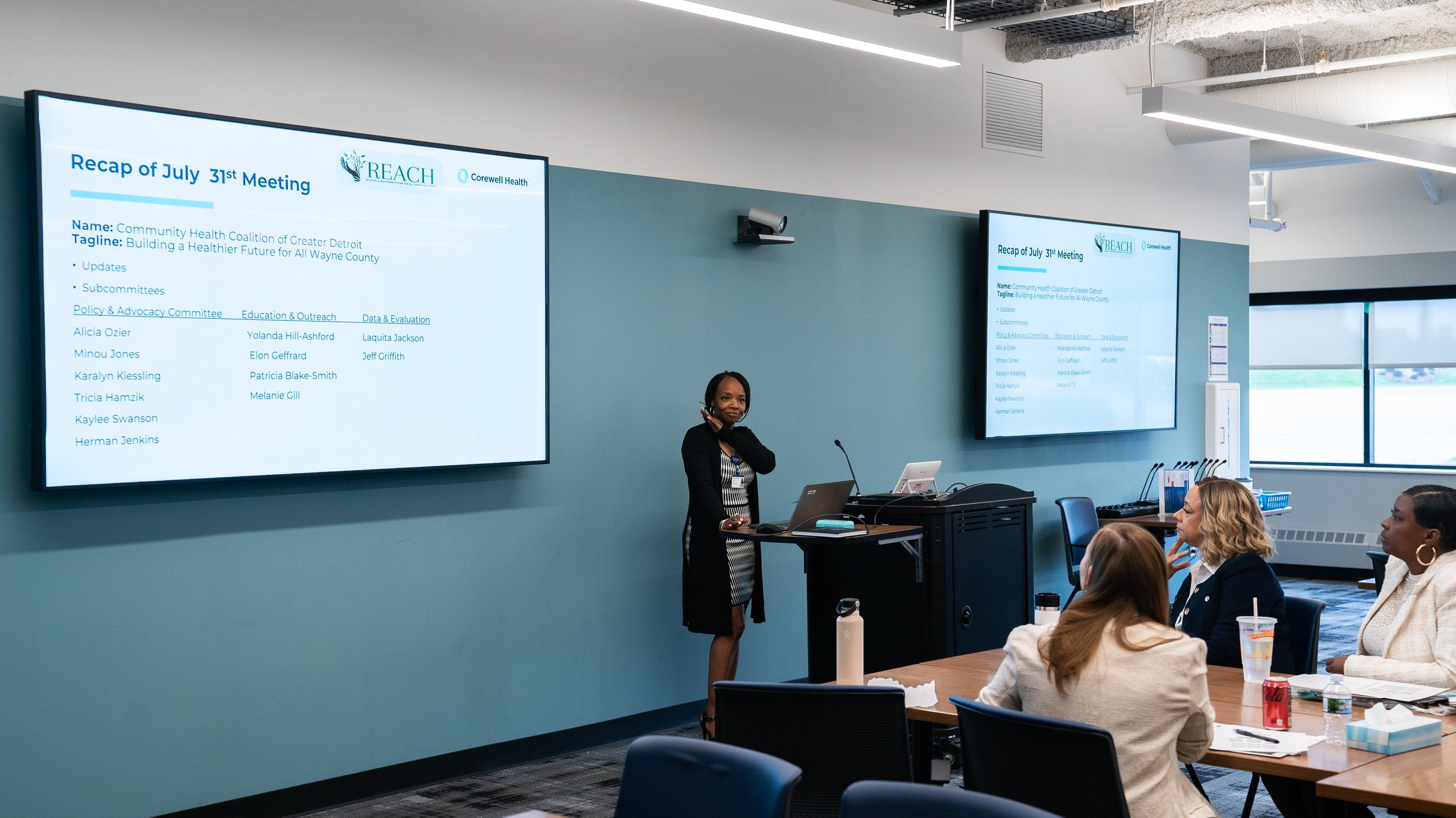 A presenter at a REACH meeting