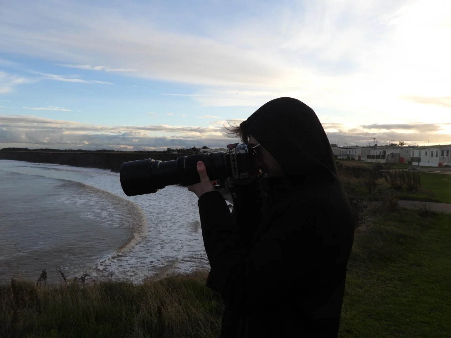 Liam Oxendale holding camera