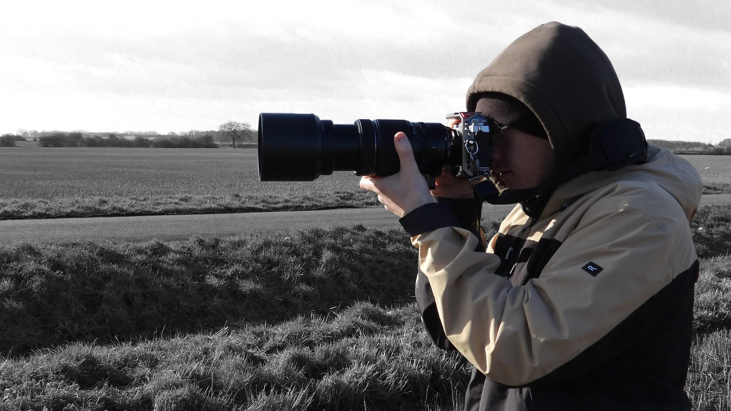 Liam Oxendale holding a camera