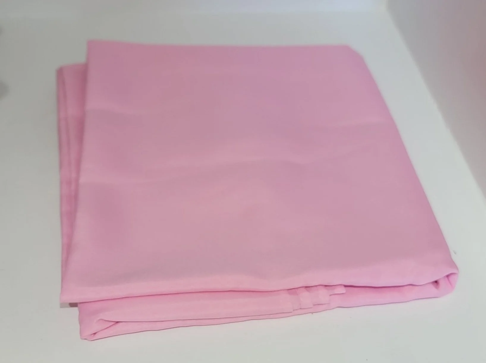Light Pink Polyester Rectangular Tablecloth •
60" x 102" •
Quantity in Stock: 1