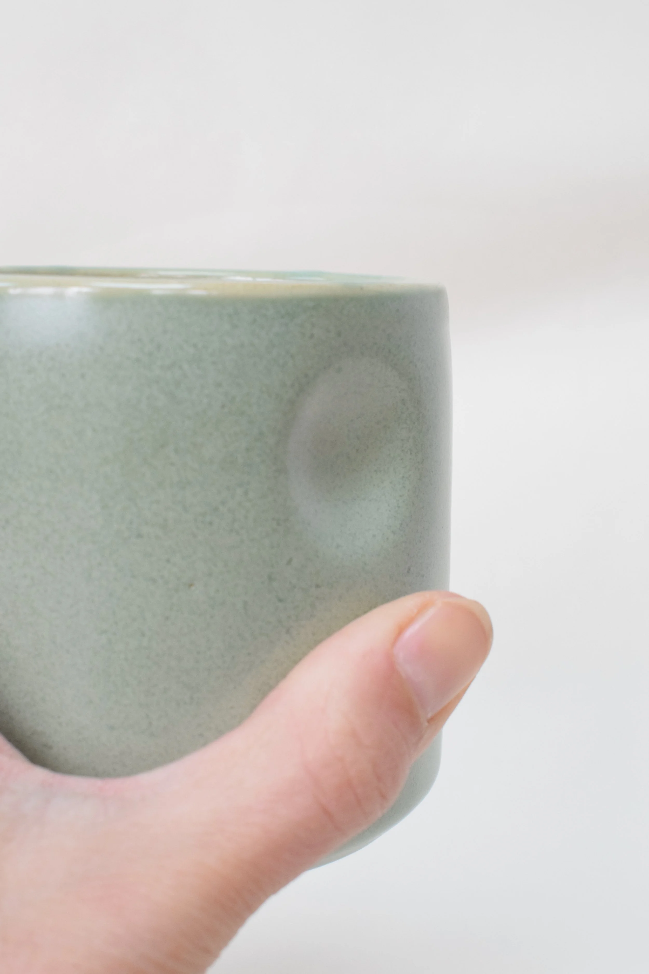 J Lucas Pottery_green dimple cup_close up.jpeg