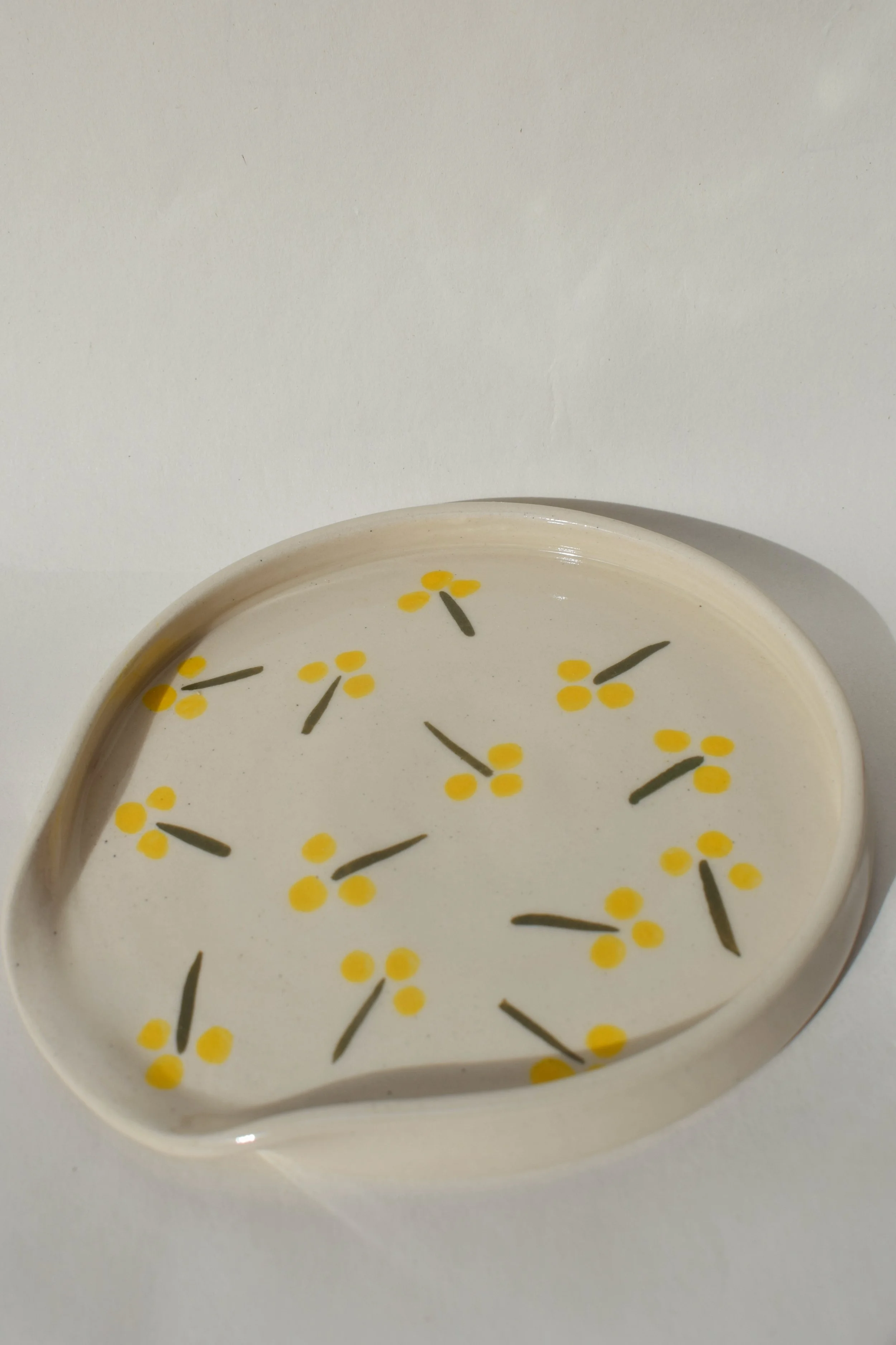 J Lucas Pottery_buds spoonrest.jpeg