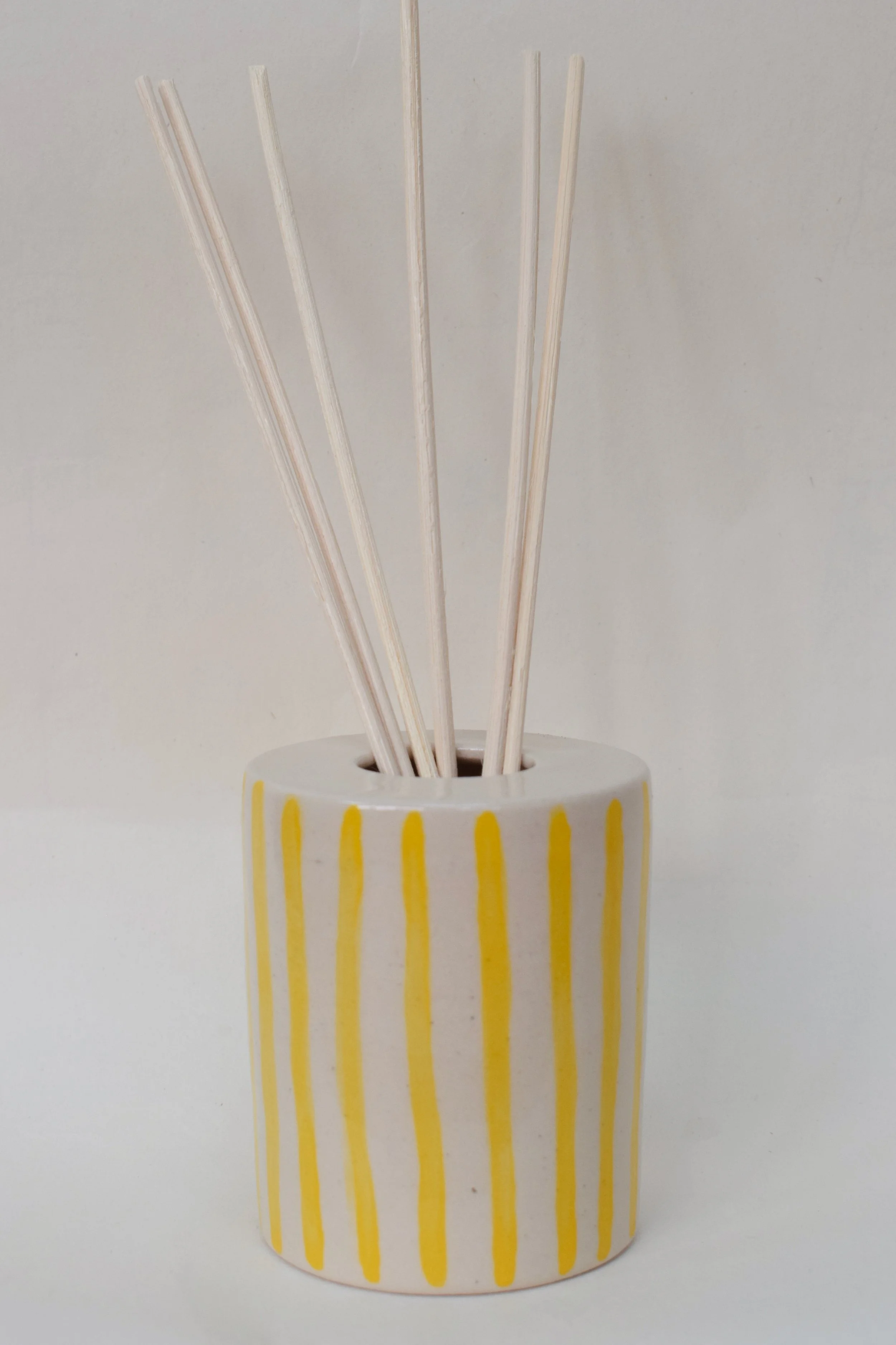 J Lucas Pottery_yellow stripe diffuser pot.jpeg