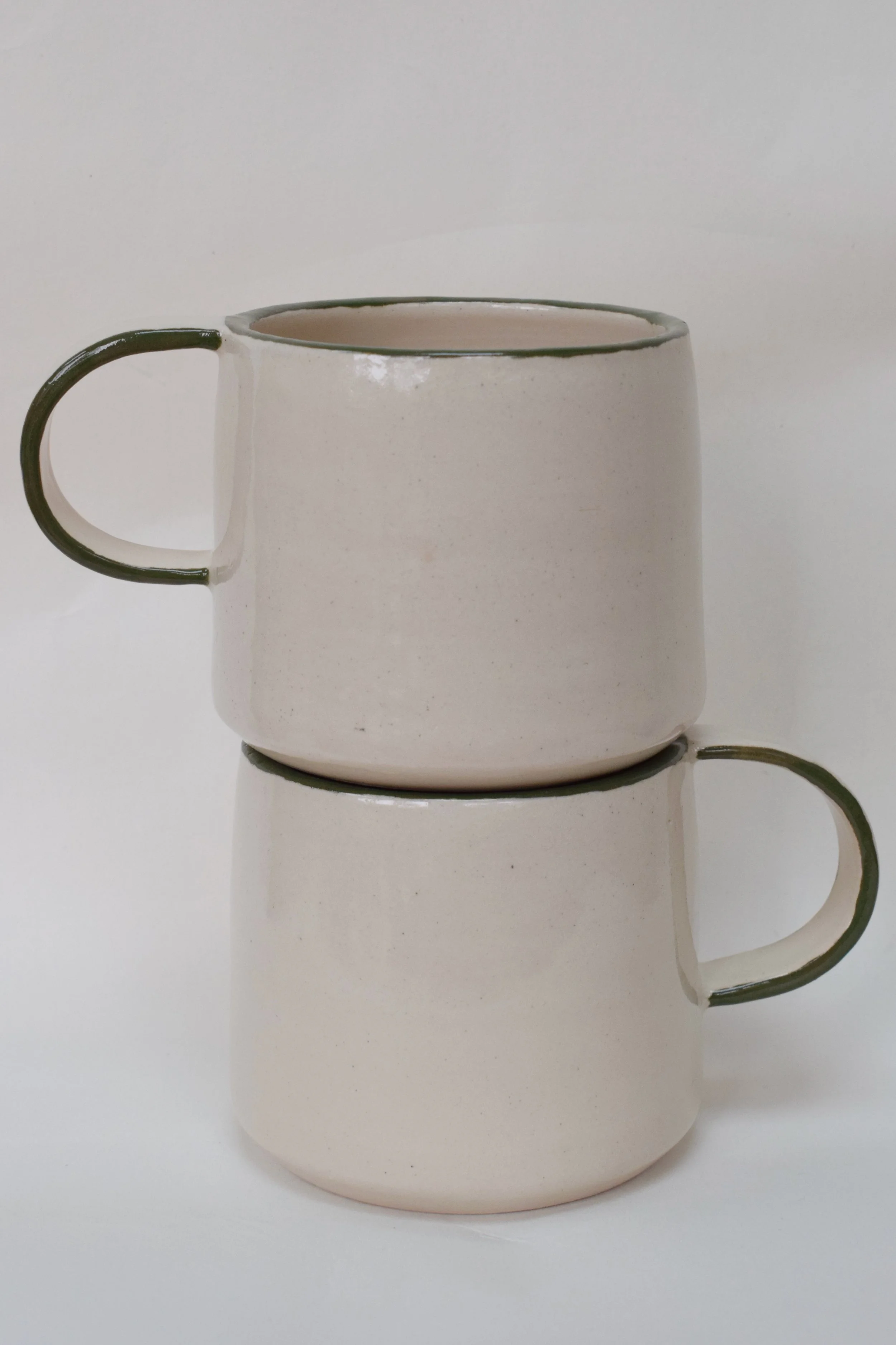J Lucas Pottery_green edge mugs_stacked.jpeg