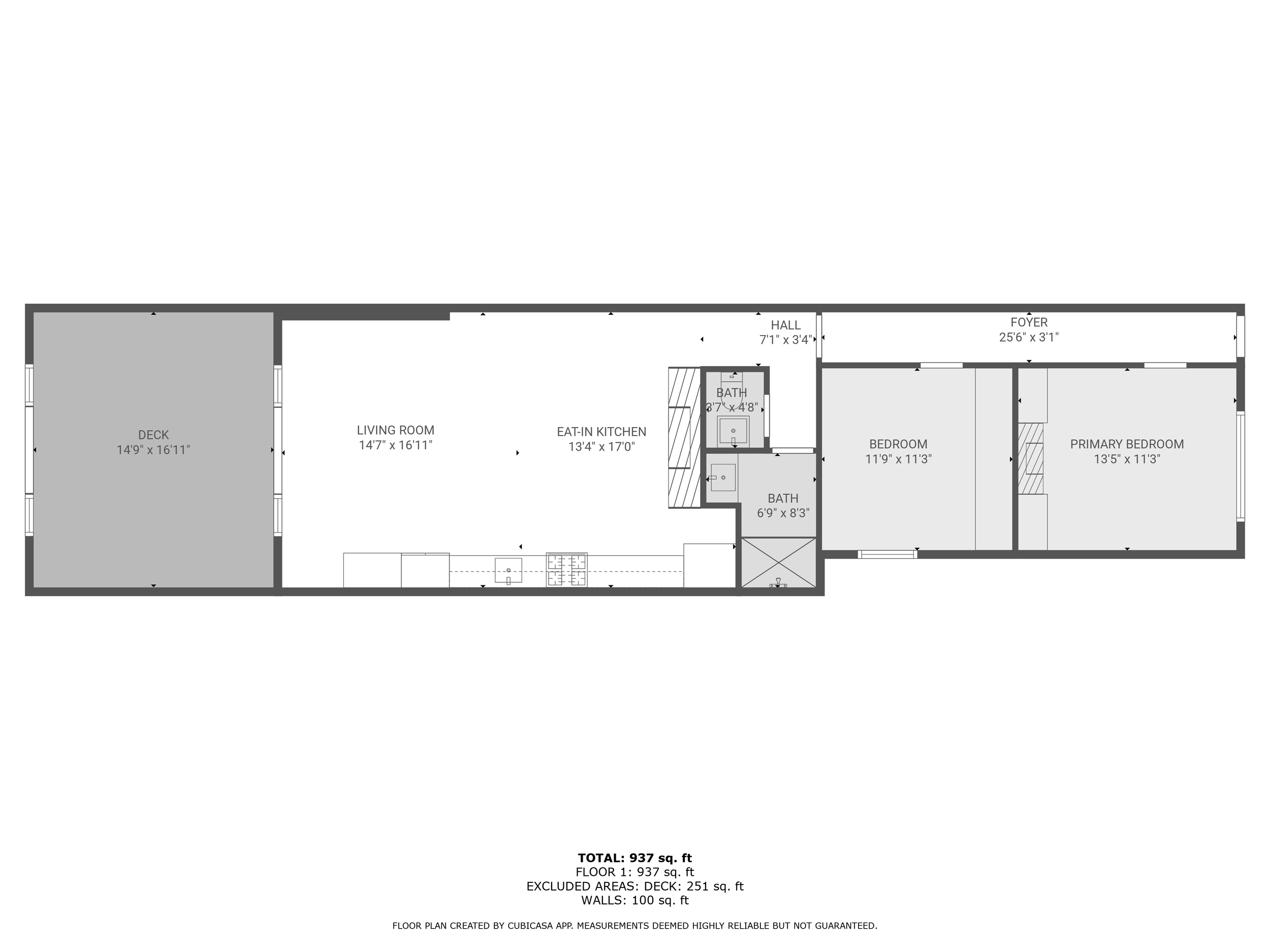 Floor plan of a house showing a deck, living room, eat-in kitchen, two bathrooms, hall, foyer, two bedrooms, and primary bedroom with measurements in feet and inches.