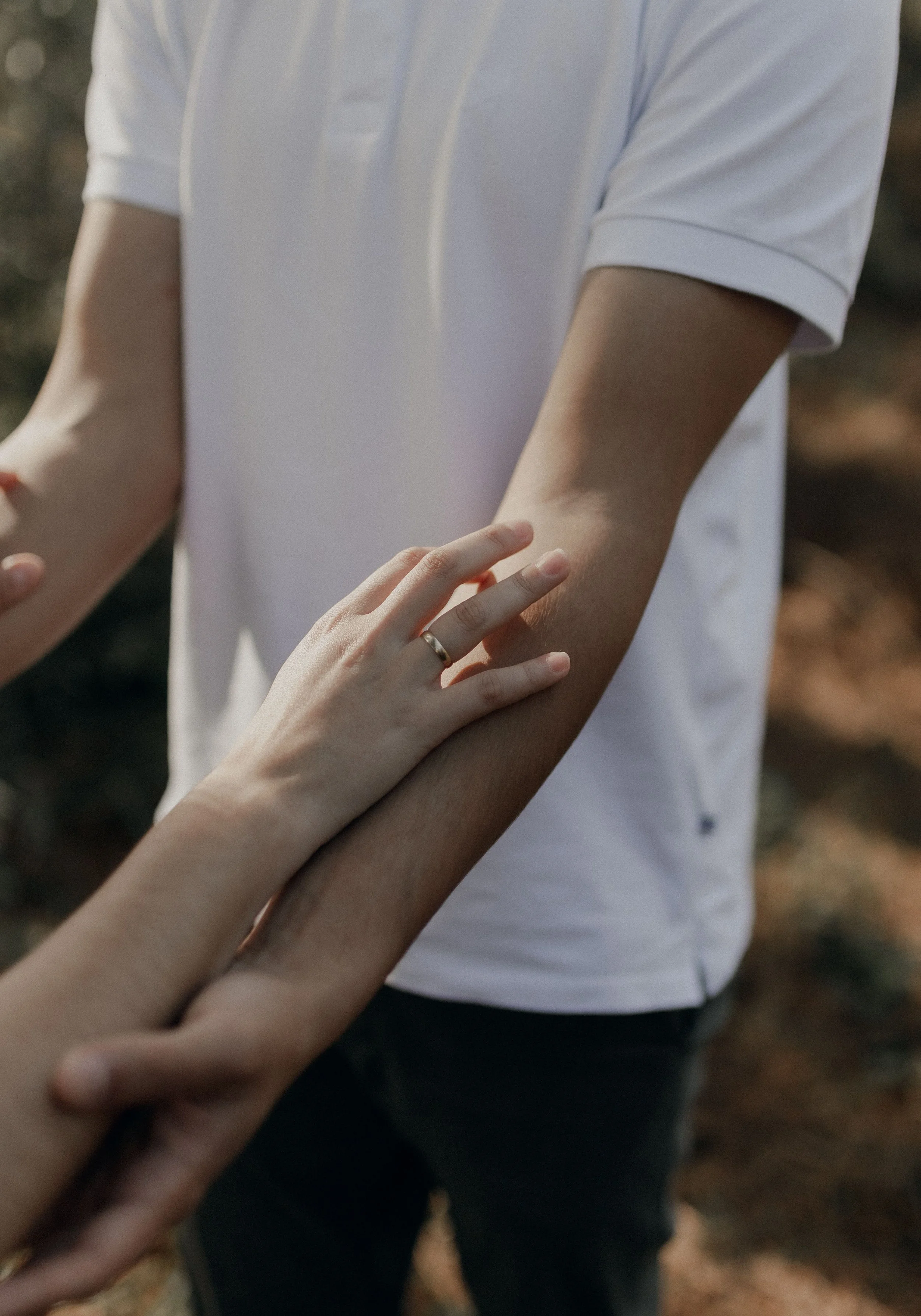 Couple holding hands after gottman method couples therapy