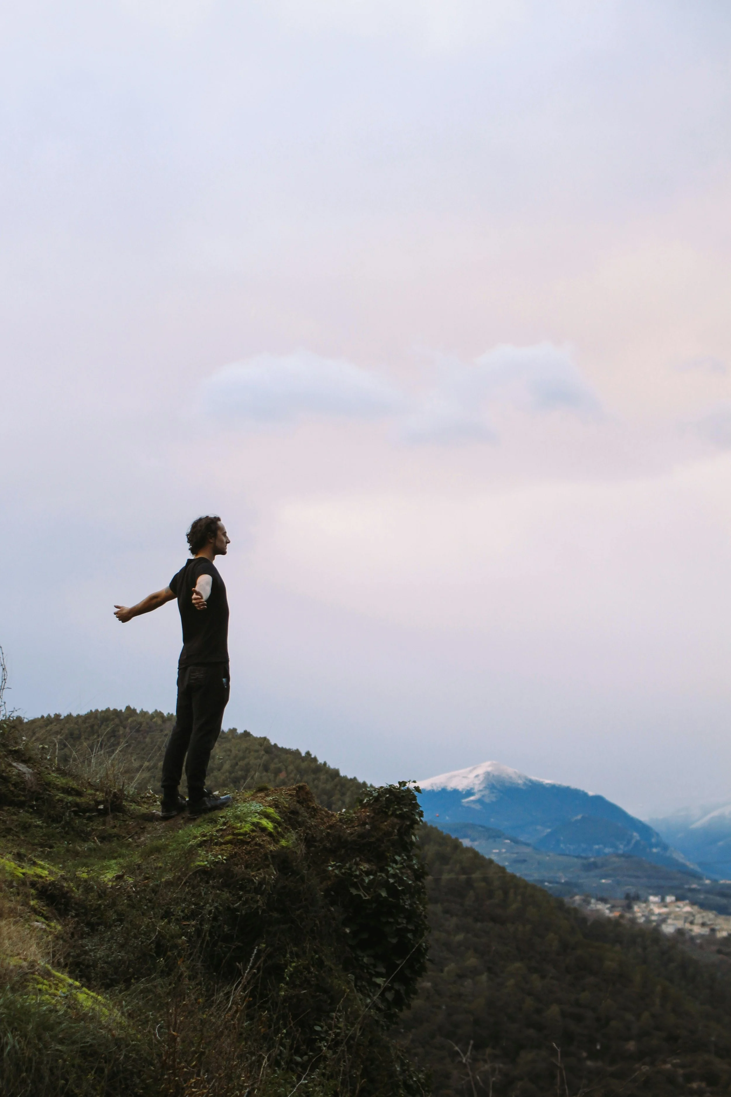 man standing in nature with a regulated nervous system after understanding the vagus nerve and trauma