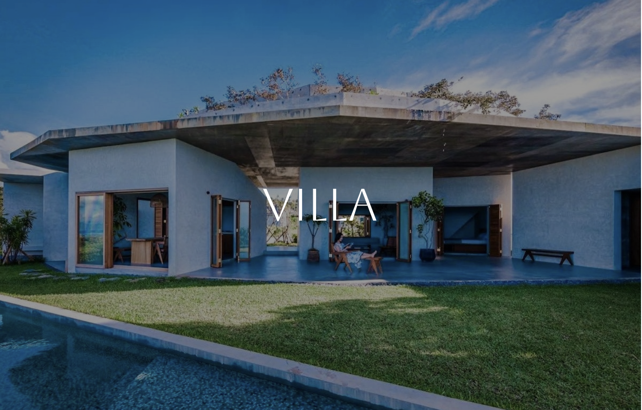 Modern villa with an outdoor patio, open doors, and a swimming pool, under a partly cloudy sky.