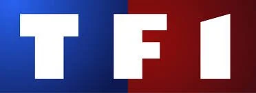 Logo de la chaîne de télévision TF1 avec des lettres blanches sur fond bleu et rouge