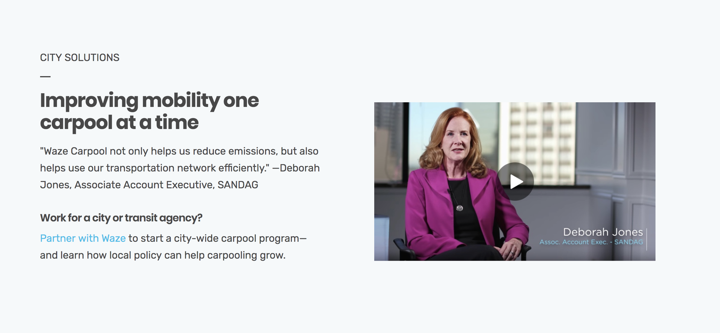 A video thumbnail showing Deborah Jones, Associate Account Executive at SANDAG, sitting in an office with city buildings visible through the window. She has red hair and is wearing a magenta blazer over a black top.