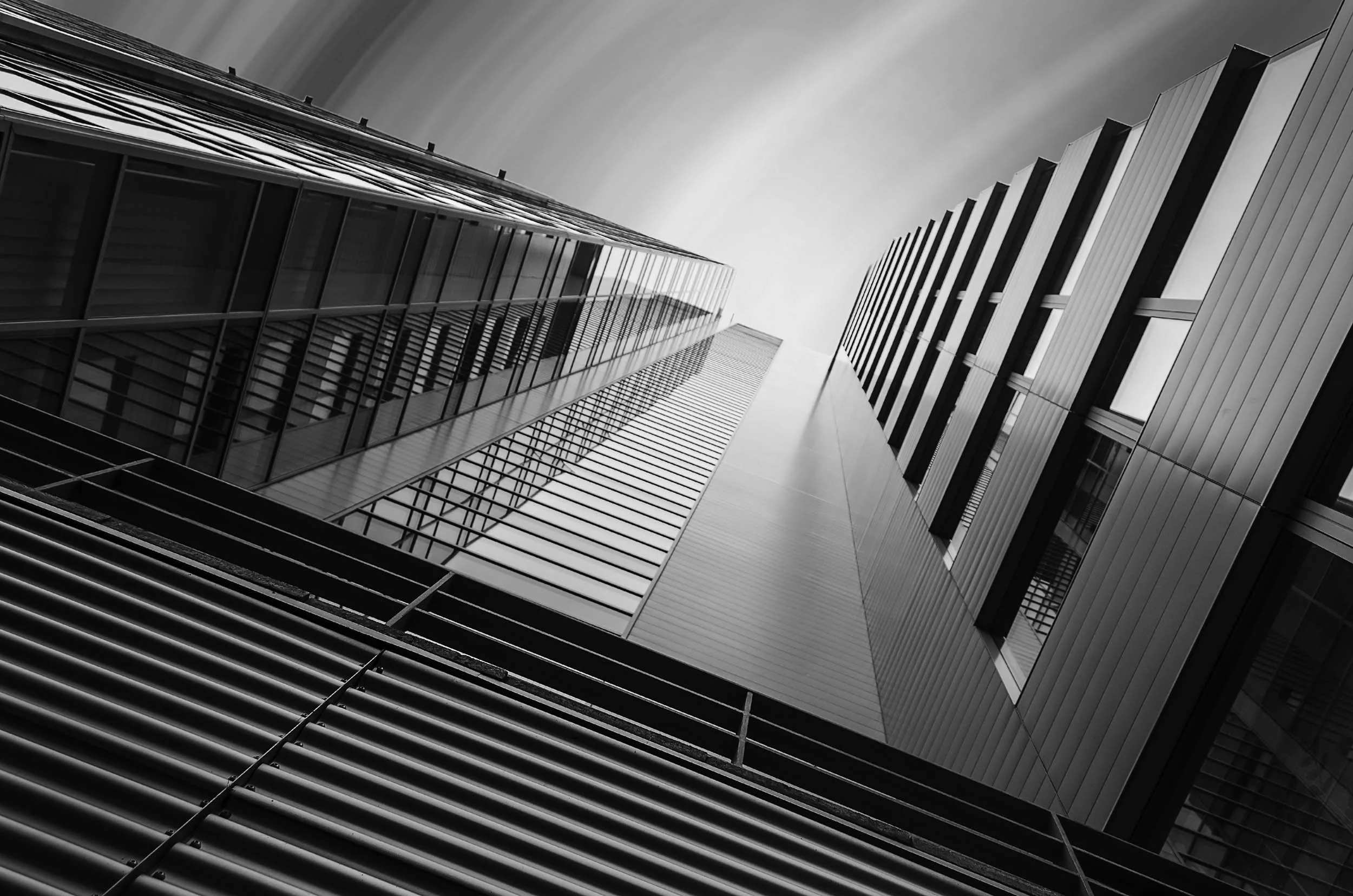 photo of modern office block taken looking up from ground to the sky