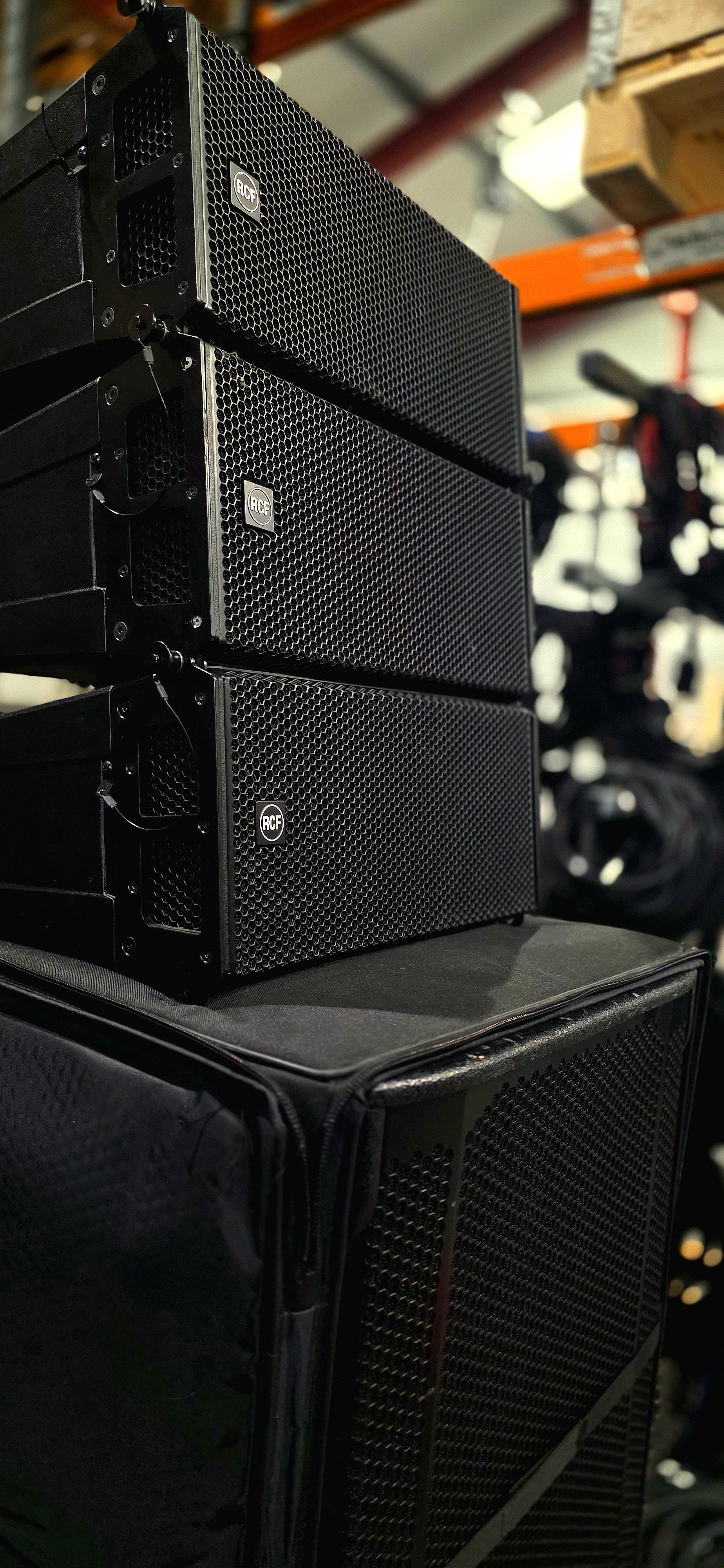 RCF HDL 6A Compact line array modules stacked on a as8003as sub